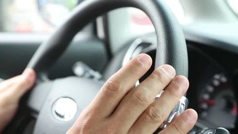 Korean Driver Tapping Fingers on Steering Wheel Stock Footage 333347187