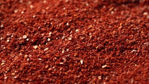 Korean dry red pepper flake powder coarse chili ground Gochugaru background Stock Footage 254390212