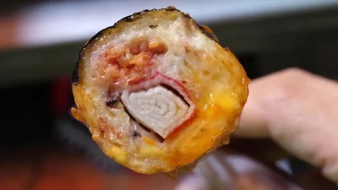 Korean Fried Fish Cake with Crab Stick Close Up Stock Footage 337374564
