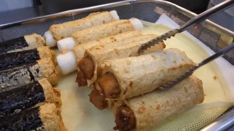 Korean Fried Seaweed-wrapped Fish Cakes Appetizing Street Food Display Video stock 337374969