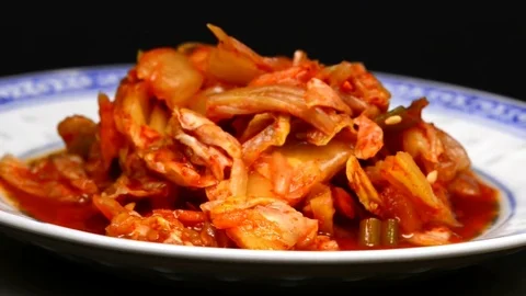 Korean Kimchi on a turn table Stock Footage 82598576
