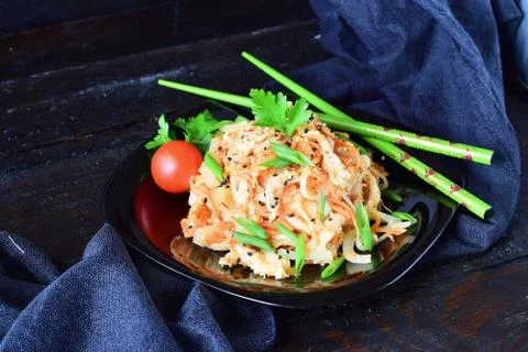 Korean kitchen. Raw marinated chicken in soy sauce, spices, onions, carrots Stock Photos