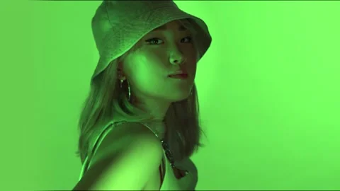 Korean model in studio with colored green light and water reflection Stock Footage 138926387