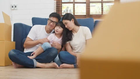 Korean Mom, Dad, and daughter embracing | Stock Video | Pond5
