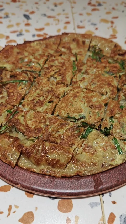 Korean pancake on a pan Stockbeeldmateriaal 328266592