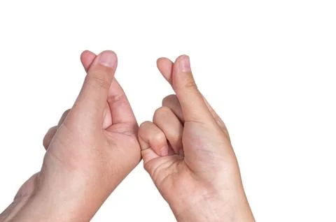 Korean style heart shapes with two fingers on a white isolated background, lo Stock Photos