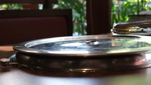 Korean table with hot pot opens black pot of Korean Beef Stew on a dining table Stock Footage 316260747