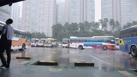 Korean waits for bus at Nambu Bus Terminal during Covid-19 Stock Footage 139756945