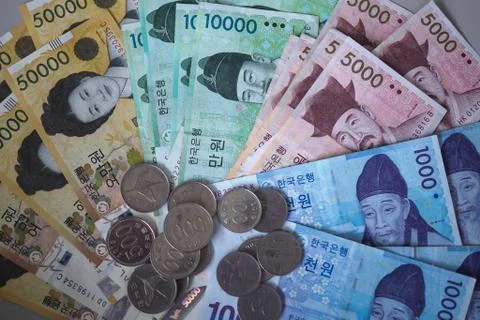Korean won notes and Korean won coins for money concept background Stock-Fotos