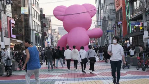 Koreans and foreigners walking around Hondae on Halloween during Covid-19 Stock Footage 164382245