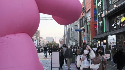 Koreans and foreigners walking around Hondae on Halloween during Covid-19 Stock Footage 164419422