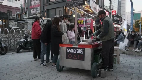 Koreans and foreigners walking around Hondae on Halloween during Covid-19 Stock Footage 164421162