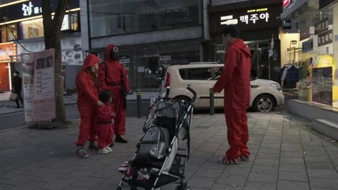 Koreans and foreigners walking around Hondae on Halloween during Covid-19 Stock Footage 164421386