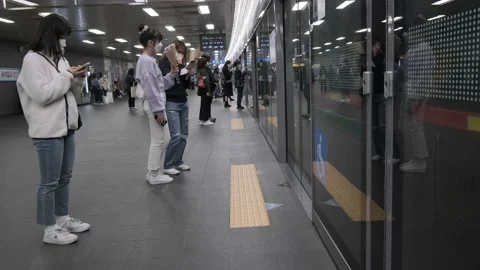 Koreans and foreigners walking around Hondae on Halloween during Covid-19 Stock Footage 164421400