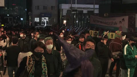 Koreans and foreigners walking around Itaewon on Halloween during Covid-19 Stock Footage 165152783