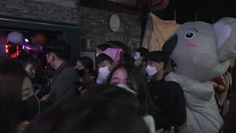 Koreans and foreigners walking around Itaewon on Halloween during Covid-19 Stock Footage 165152921