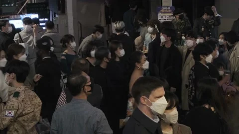 Koreans and foreigners walking around Itaewon on Halloween during Covid-19 Stock Footage 165153003