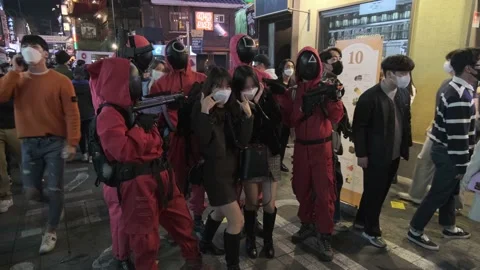 Koreans and foreigners walking around Itaewon on Halloween during Covid-19 Stock Footage 165154201