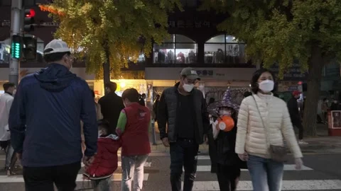 Koreans and foreigners walking around Itaewon on Halloween during Covid-19 Stock Footage 165155074