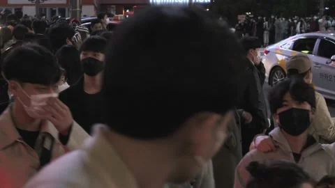 Koreans and foreigners walking around Itaewon on Halloween during Covid-19 Stock Footage 165155193