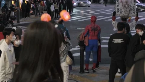 Koreans and foreigners walking around Itaewon on Halloween during Covid-19 Stock Footage 165155928