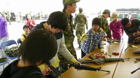 Koreans testing guns Video stock 8928258