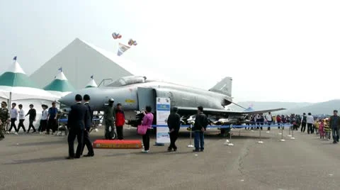 Koreans watch army jet Video stock 8926224
