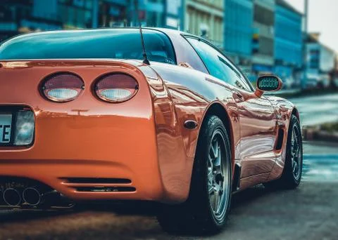 Koszalin, Poland, October 19, 2018: Red sports car on a city street Stock Photos