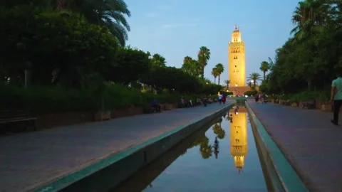 The Koutoubia mosque and its reflection with people traffic Stock Footage 201222070