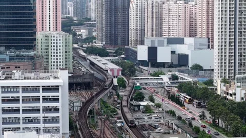 Kowloon Bay Station Elevated MTR Platform with City View July 6 2025 Stock Footage 312780377