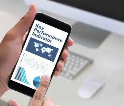 KPI acronym (Key Performance Indicator) Business team hands at work with fina 写真素材