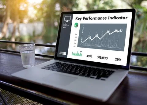 KPI acronym (Key Performance Indicator) Business team hands at work with fina Foto stock