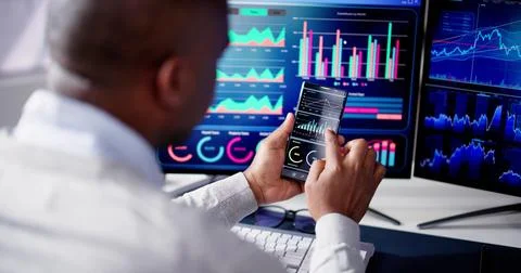 KPI Business Analytics Data Dashboard. Analyst Using Computer Stock Photos