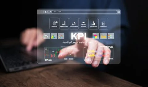 KPI key performance indicator. A businessman with computer notebook tapping.. Stock Photos