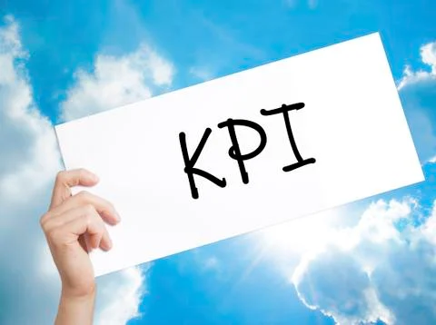 KPI (Key Performance Indicator) Sign on white paper. Man Hand Holding Paper.. Stock Photos