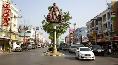 Krabi stop light neanderthal man statue Stock-Footage 61701522