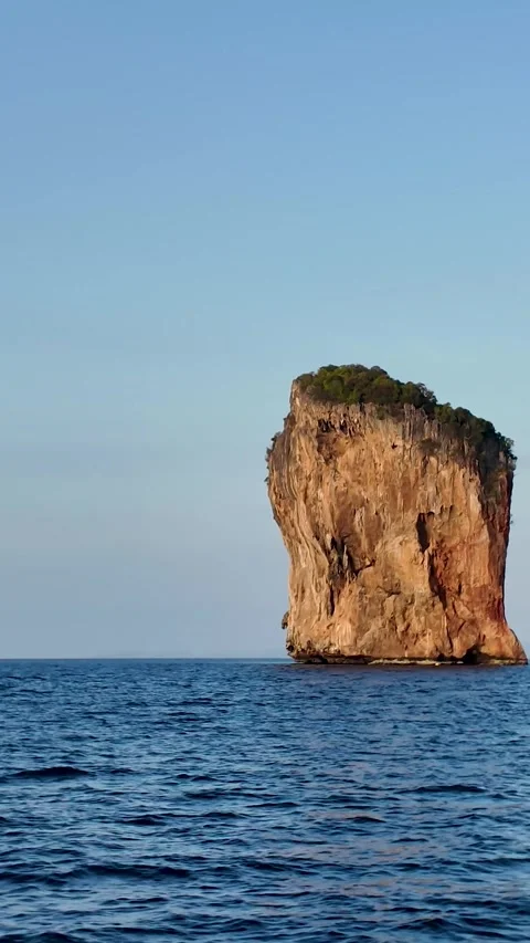 Krabi Thailand Massive Limestone Cliff Rising From Sea With Island In Background Stock Footage 333222699