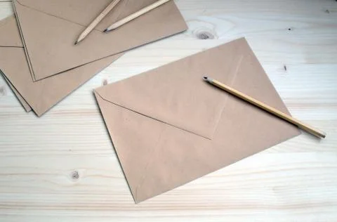 Kraft brown envelope study work creativity inscription Stock Photos