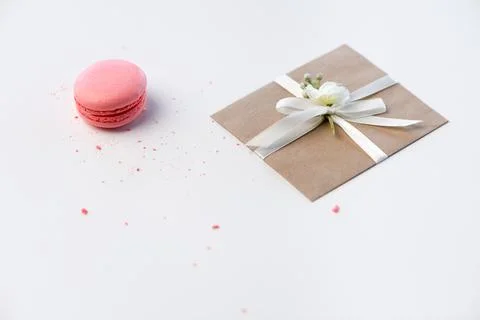 Kraft envelope and macaron Stock Photos