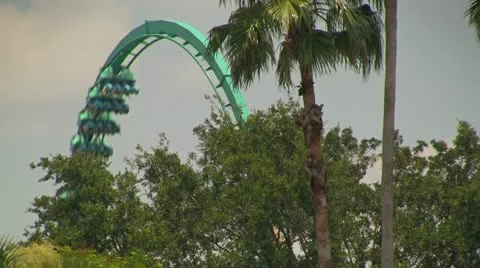Kraken Rollercoaster Doing a Loop Stock Footage 21894796