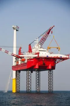 The Krakken, a jack up barge, that is constructing the wind turbines of the W Stock Photos