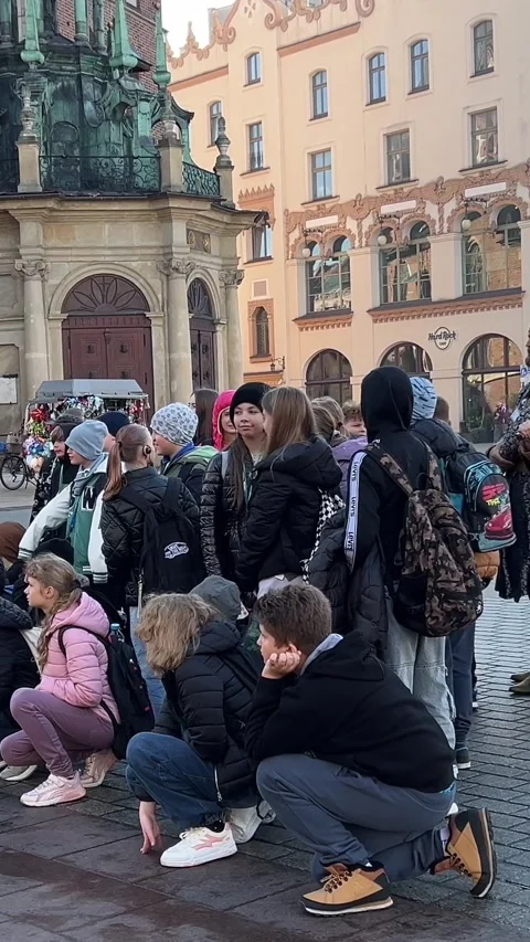 Krakow, Poland 11.06.2024 children on an excursion school class listening to a 動画素材 290971053