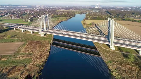 Krakow, Poland.  Double cable-stayed bridge over the Vistula river Stock Footage 135376412