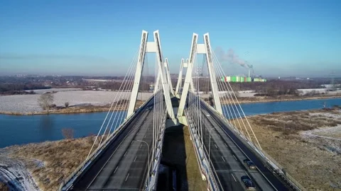 Krakow, Poland.  Double cable-stayed Macharski bridge over the Vistula river Stock Footage 221409844