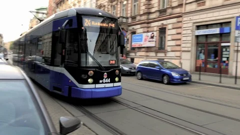 Krakow, Poland - Tram Passes Closely by Camera 스톡 동영상 89575341