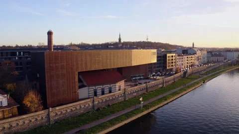 Krakow's Waterfront Featuring the Iconic Cricoteka Building Stock Footage 315948843