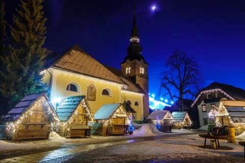Kranjska Gora Christmas Decorated Square, Alpine village by night Stock Photos