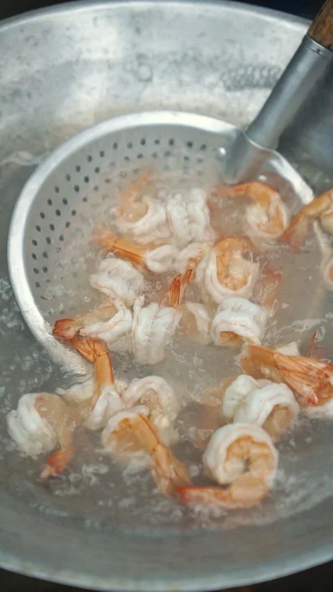 Krapow Koong, Thai stir-fried prawns with holy basil and fried eggs. Stock Footage 337464465