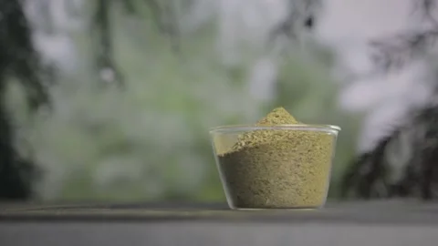 Kratom powder in a glass Stock Footage 147262571