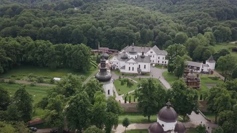 Krehiv monastery surrounded by a peaceful forest, shot wit a drone in 4K Stock Footage 132697371